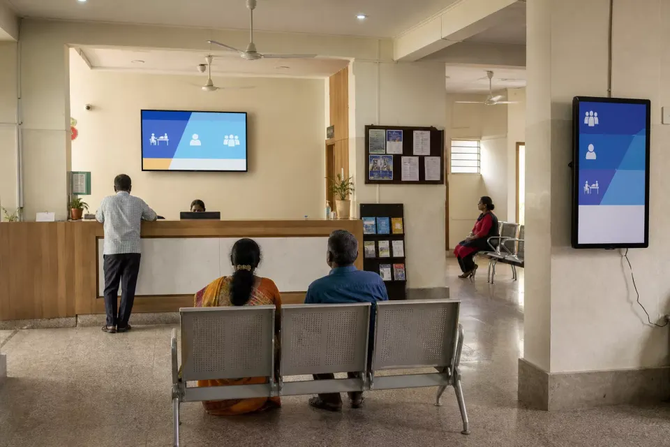 Programme and citizen-service display inside an Indian public service centre